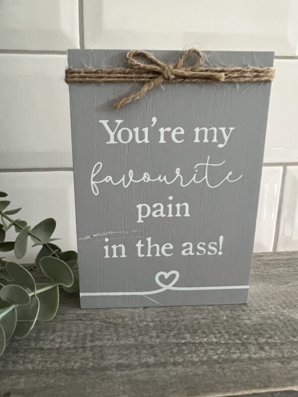 WC pain in the ass plaque